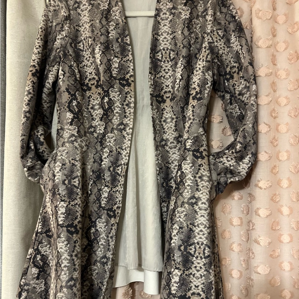 Free People Size XS  Reptile Print Spandex Jacket 
Brand New 
No Tags 
No Box